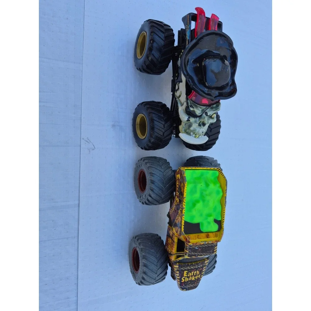 Monster Jam Pirates Curse and Zombie vs Hunter Earth Shaker Die-Cast Truck Lot